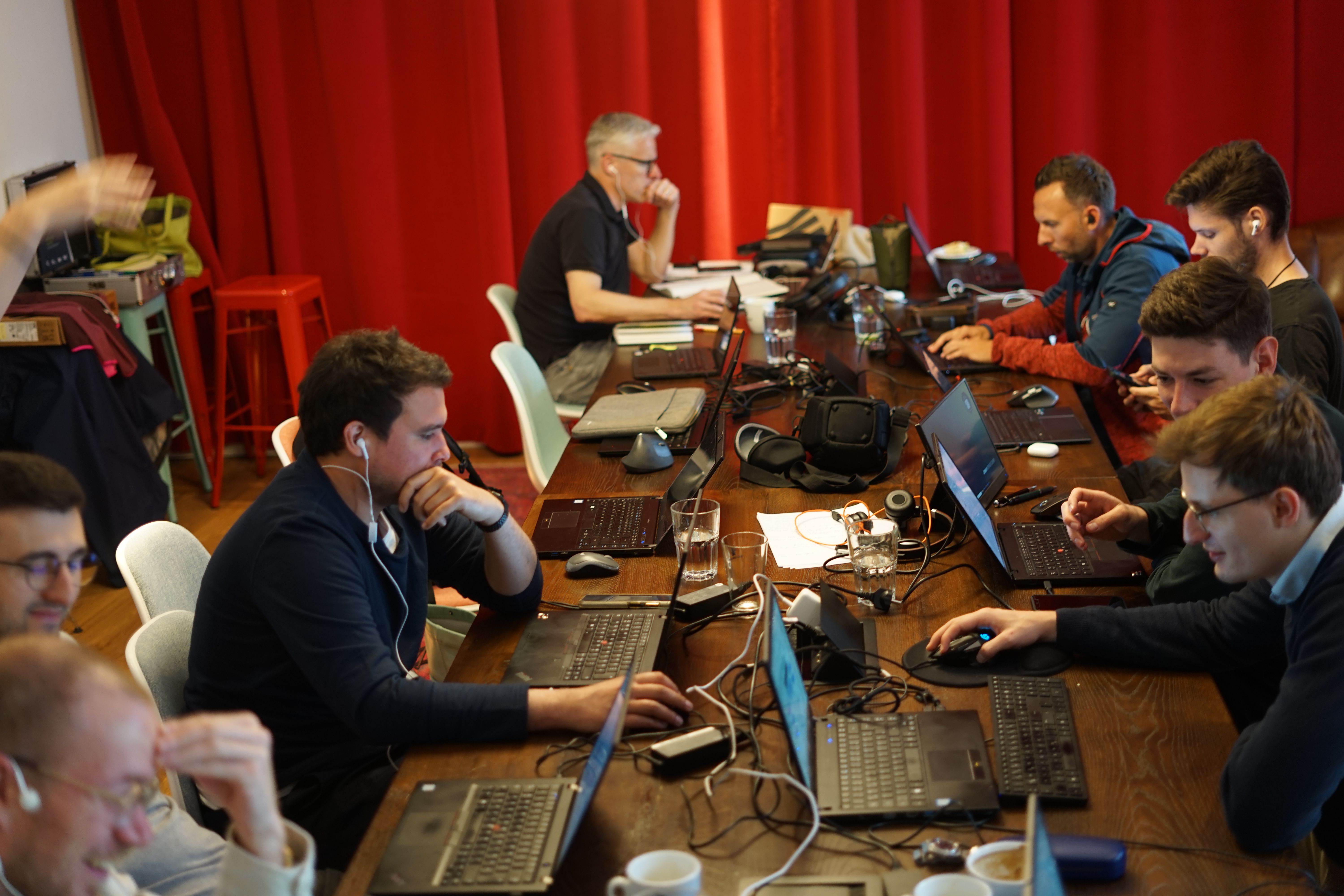 The team hard at work in the large conference Room at Ruby Paul coworking space